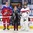 BUFFALO, NEW YORK - DECEMBER 28: Russia's Klim Kostin #24 and Switzerland's Philip Wuthrich #30 are recognized as players of the game during the preliminary round of the 2018 IIHF World Junior Championship. (Photo by Andrea Cardin/HHOF-IIHF Images)

